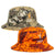 A reversible bucket hat, one side Desolve camouflage and one Desolve Fire, with 'Hunters Element' branding.