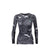 A woman's long-sleeved base layer shirt with camouflage pattern, featuring a high neck and athletic cut.