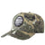 A camouflage baseball cap with 'Hunters Element' branding on the front, featuring a distressed design and the text 'DESOLVE VEIL' on the side.